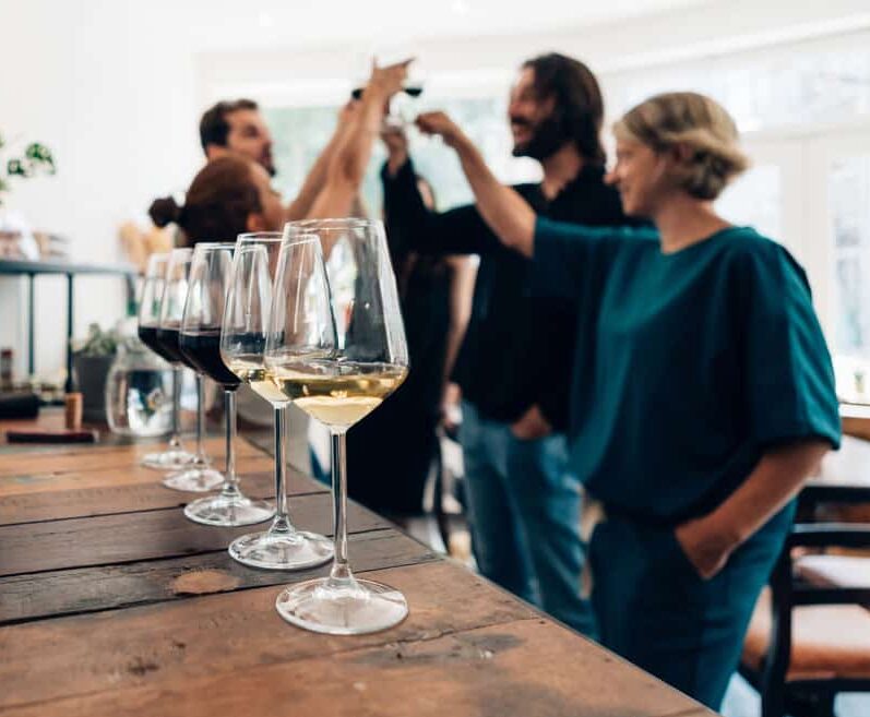 Millennials toasting at a wine tasting
